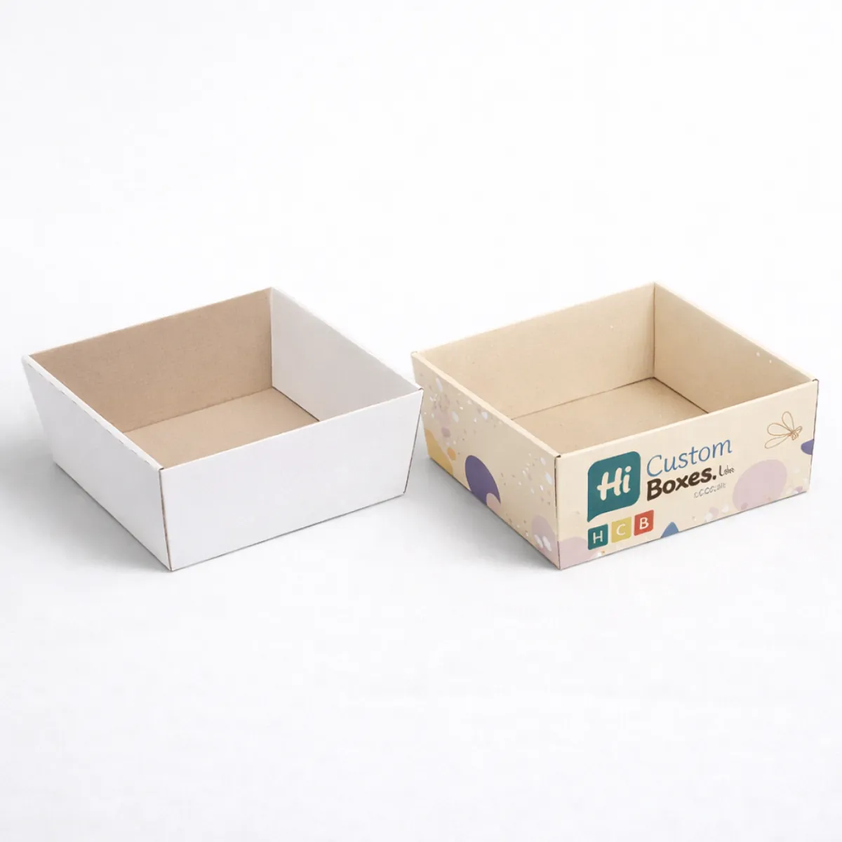Open-top shallow tray boxes in white and cream- perfect for displaying curated gift hamper sets- class=